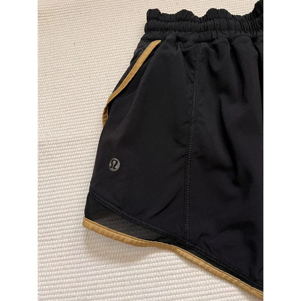Lululemon Super Squad Short in Black/Gold Size US 6